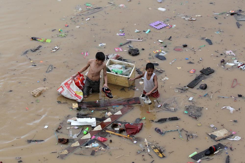 The Weekend Leader - Tropical storm leaves 8 dead in Philippines