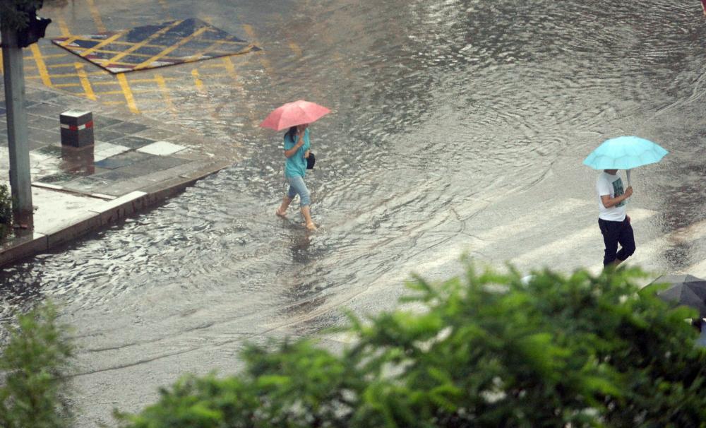 The Weekend Leader - Heavy rain affects over 16,000 in China