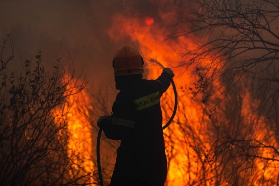 The Weekend Leader - One dead, over 40 injured in wildfires near Athens