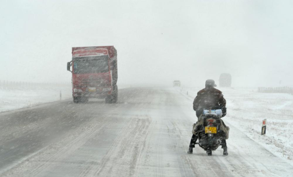 The Weekend Leader - As snowstorm hits, is it a COP-out for China in Glasgow?