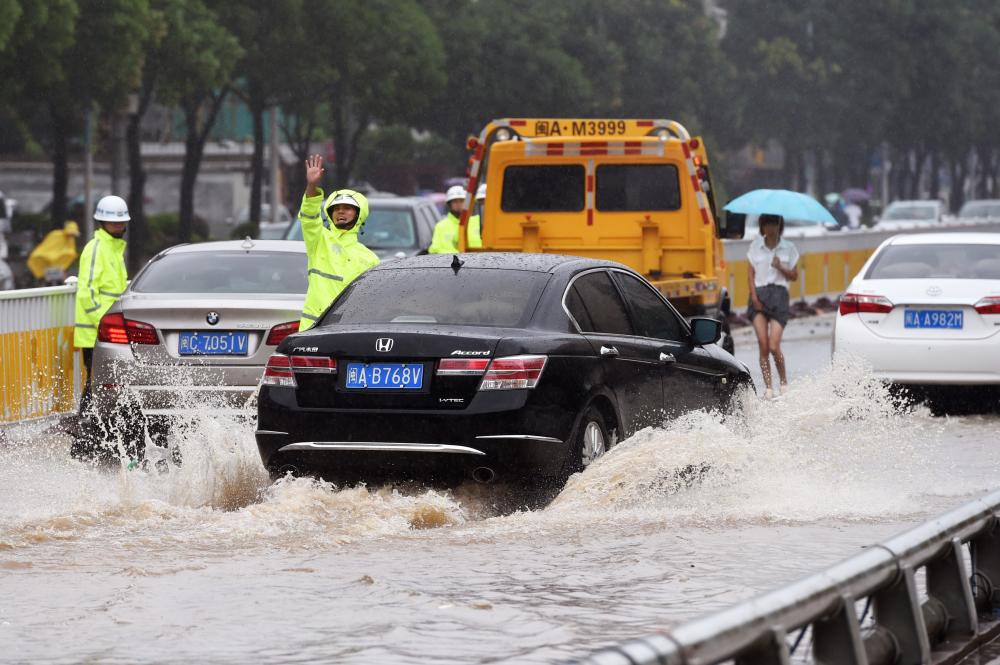 The Weekend Leader - Rainstorms affect over 500K people in China, alert level upgraded