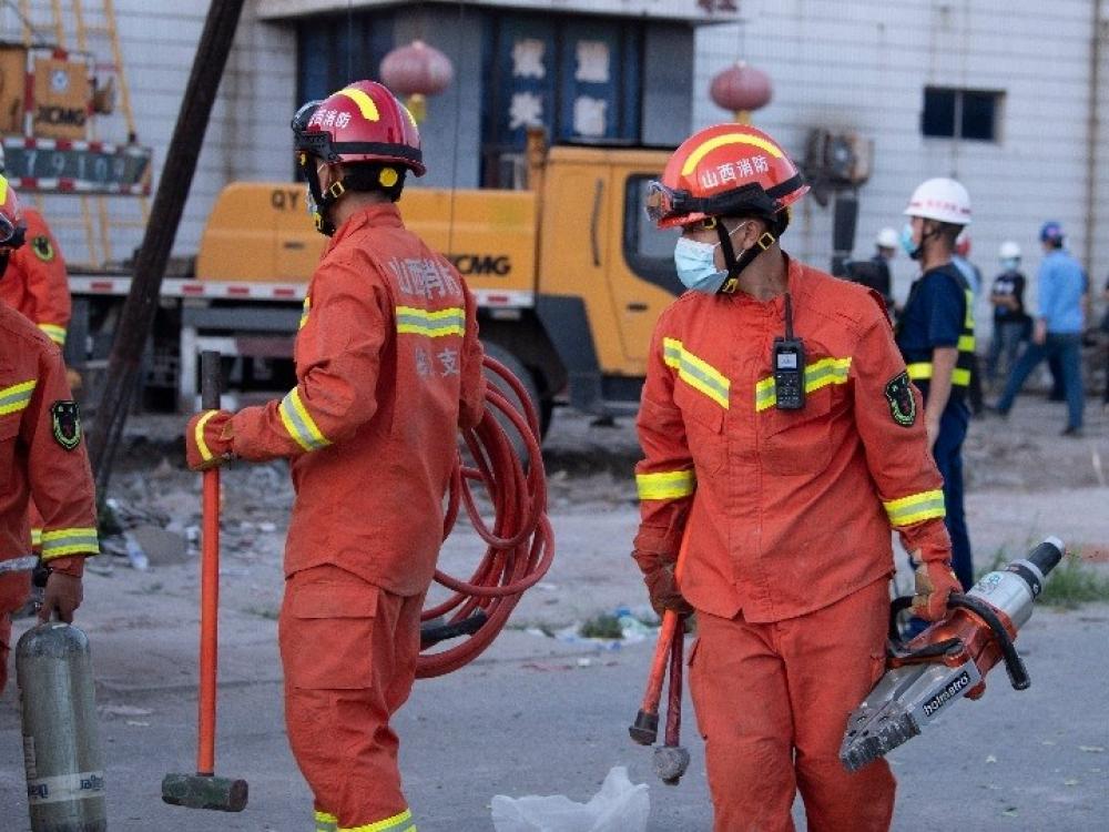 The Weekend Leader - 13 dead in China iron mine accident