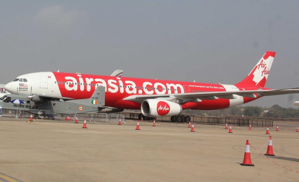 The Weekend Leader - AirAsia India operates 9 flights with fully vaccinated crew