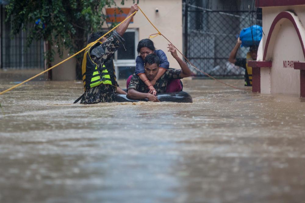 The Weekend Leader - 48 died, 31 missing in Nepal's flood and landslides