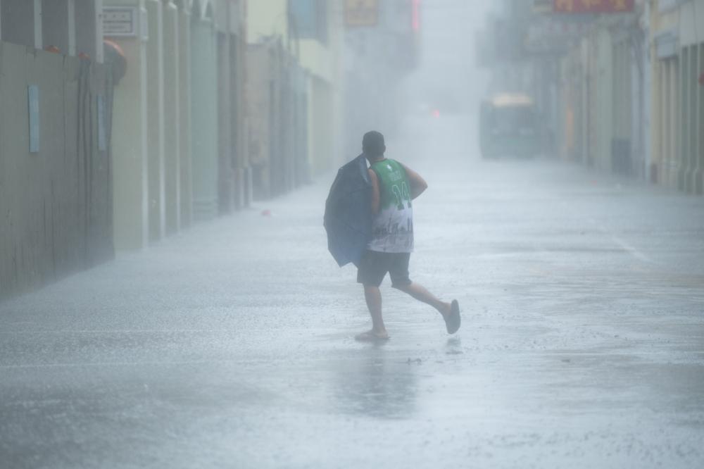 The Weekend Leader - Heavy rainstorms lash China