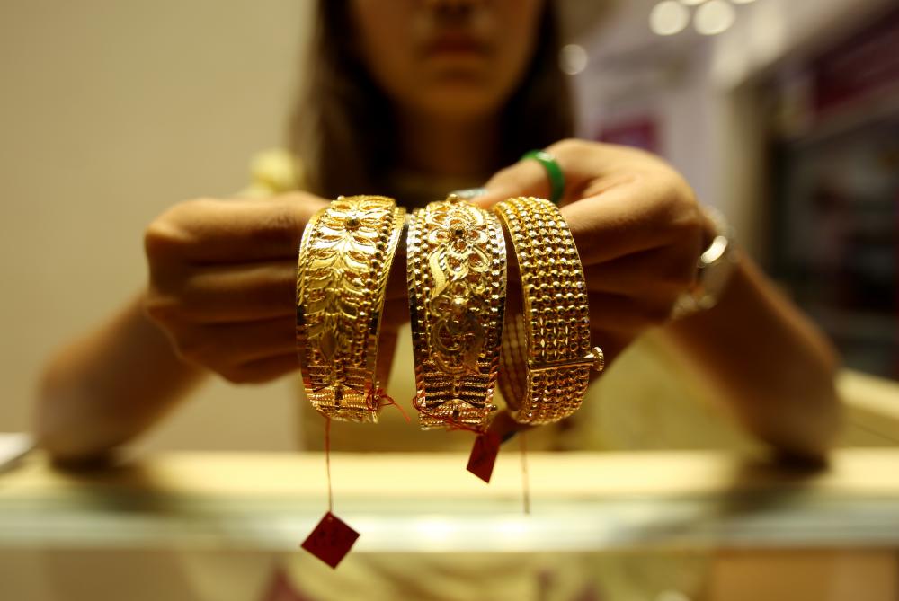 The Weekend Leader - India's gold imports rose in May, while silver imports decline