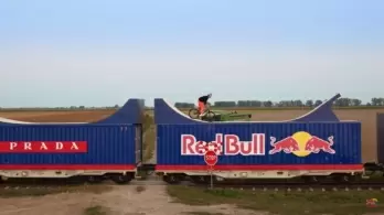 Red Bull Stunt: Dawid Godziek Performs World?s First Bike Flip on Moving Train